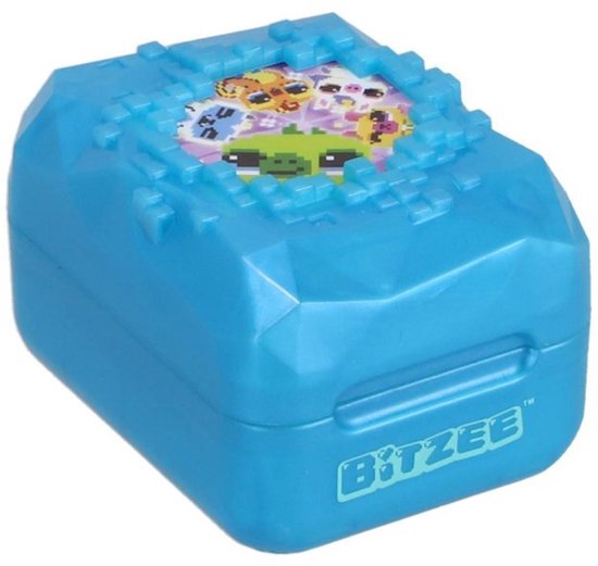 Blauw Bitzee speelgoedje met pixel-afbeeldingen van verschillende diertjes op de dop.
