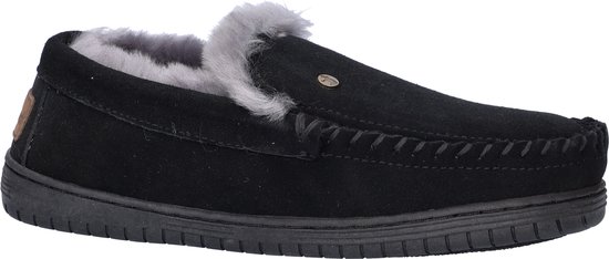 Zwarte suède pantoffel met grijze schapenvacht voering en bruin logo label.