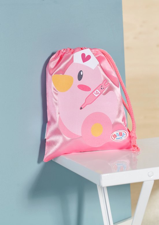 Roze tas met een eendje met dokterspak, thermometer en 'BABY born'-logo.