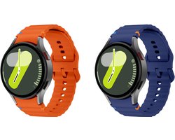 Strap-it Bundel van 2 Siliconen Wave Bandjes - Geschikt voor Samsung Galaxy Watch 7 44mm - Donkerblauw & Oranje - Sportbandje - Sportarmband - Siliconen Band - Wave Bandje - Waterbestendig & zweetbestendig