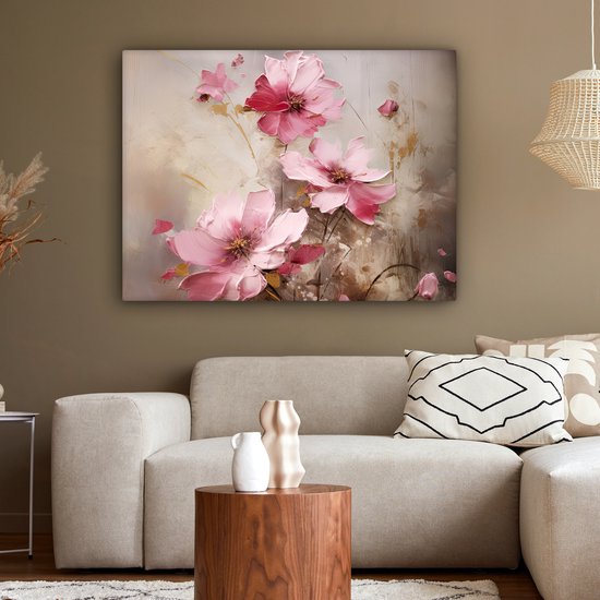 Abstract schilderij met roze bloemen op een beige achtergrond, in een woonkamer.