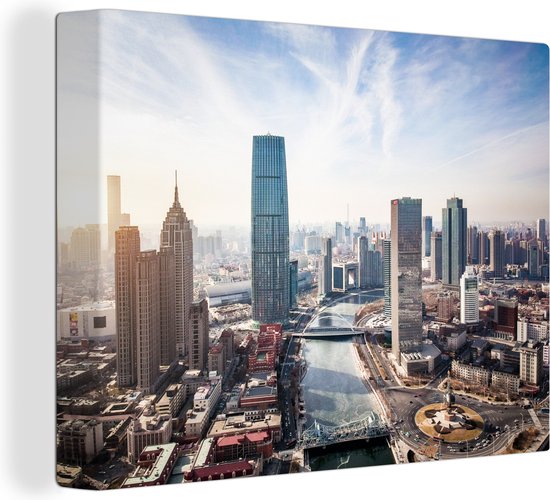 Canvas schilderij 160x120 cm - Wanddecoratie Wolken boven de stad Tianjin in China - Muurdecoratie woonkamer - Slaapkamer decoratie - Kamer accessoires - Schilderijen