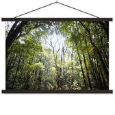 Posterhanger incl. Poster 60x40 cm - Schoolplaat - De zon schijnt door een opening in het Regenwoud in Thailand - Textielposter - Zwarte latten