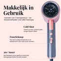 Rosegouden haardroger met knoppen voor temperatuur en blaassnelheid. Functie 'Cold Shot' voor het fixeren van krullen.