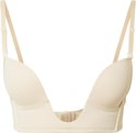Nude MAGIC Bodyfashion V-Bra met lage decolleté en afneembare bandjes.
