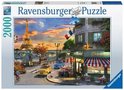 2000-delige Ravensburger puzzel met een schilderachtig tafereel van Parijs bij zonsondergang, met de Eiffeltoren, een Seine-brug, een brasserie en twee klassieke auto's.