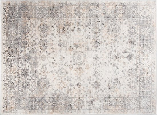 Un tapis gris clair, posé à plat, avec un motif oriental central et une bordure grise décorative.