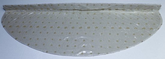 Onderkant van een beige trapmat met antislip noppen en plakrand.