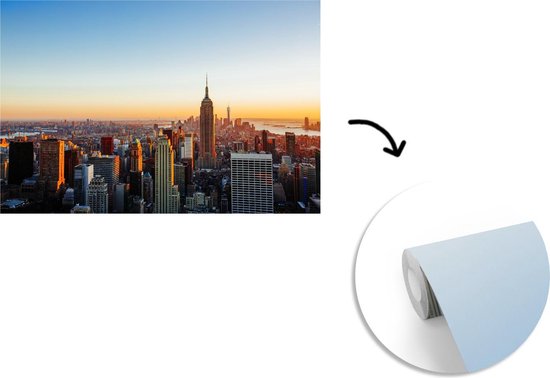 Papier peint Papier peint photo en vinyle - Skyline de New York avec un coucher de soleil largeur 390 cm x hauteur 260 cm - Tirage photo sur papier peint (disponible en 7 tailles)