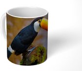 Mok - Reuzentoekan op een bemoste afgebroken tak - 350 ML - Beker