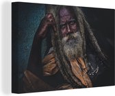 Canvas Schilderij Portret van rasta man uit Belo sur Tsiribina in Madagaskar - 60x40 cm - Wanddecoratie