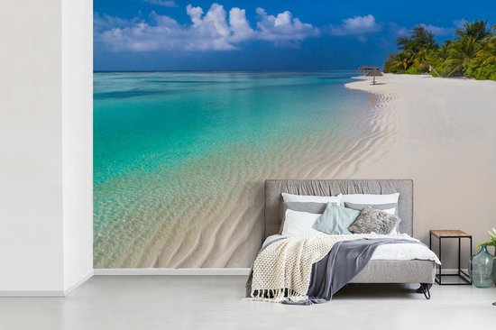 Papier peint Papier peint photo en vinyle - Vue depuis la plage tropicale sur l'eau bleu azur largeur 600 cm x hauteur 400 cm - Tirage photo sur papier peint (disponible en 7 tailles) / Mer et plage