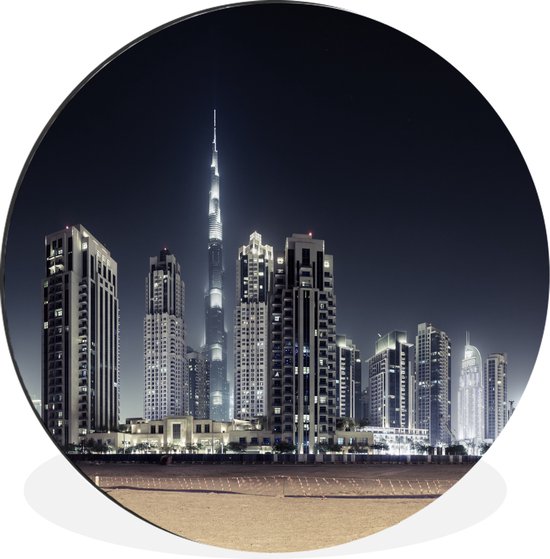 WallCircle - Wandcirkel - Muurcirkel - De Burj Khalifa verlicht met andere wolkenkrabbers de lucht boven Dubai - Aluminium - Dibond - ⌀ 60 cm - Binnen en Buiten
