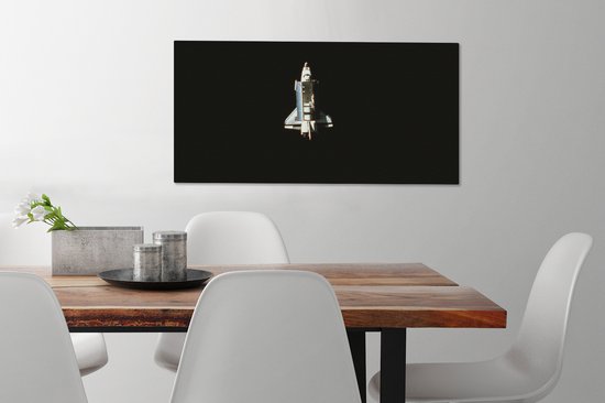 Tableau sur toile Une vue satellite d'une navette spatiale - 80x40 cm - Décoration murale
