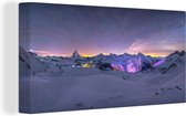 Canvas Schilderij Melkweg boven het winterlandschap van Zwitserland - 80x40 cm - Wanddecoratie