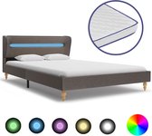 Decoways - Bed met LED en traagschuim matras stof taupe 140x200 cm