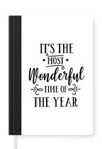 Notitieboek - Schrijfboek - Kerst quote "It's the most wonderful time of the year" met een witte achtergrond - Notitieboekje klein - A5 formaat - Schrijfblok - Kerst - Cadeau - Kerstcadeau voor mannen, vrouwen en kinderen