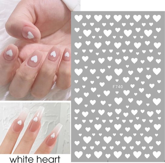 Wit hartjes nagelstickers op een grijze achtergrond. Nagelvoorbeeld met witte hartjes op korte en lange nagels.