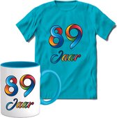 89 Jaar Vrolijke Verjaadag T-shirt met mok giftset Blauw | Verjaardag cadeau pakket set | Grappig feest shirt Heren – Dames – Unisex kleding | Koffie en thee mok | Maat M