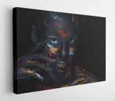 Portrait of a young woman who is posing covered with black paint in the studio on a black background  - Modern Art Canvas - Horizontal - 368988482 - 115*75 Horizontal