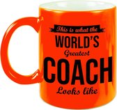 Worlds Greatest Coach cadeau koffiemok/theebeker neon oranje 330 ml