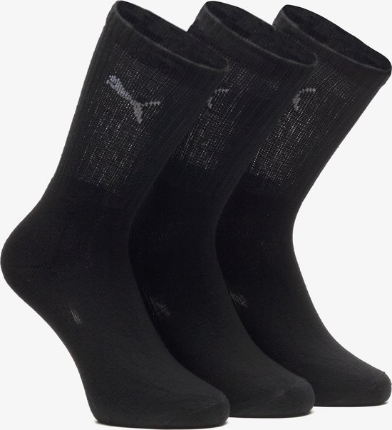 Drie zwarte sokken met ribbels en Puma-logo op de kuit.