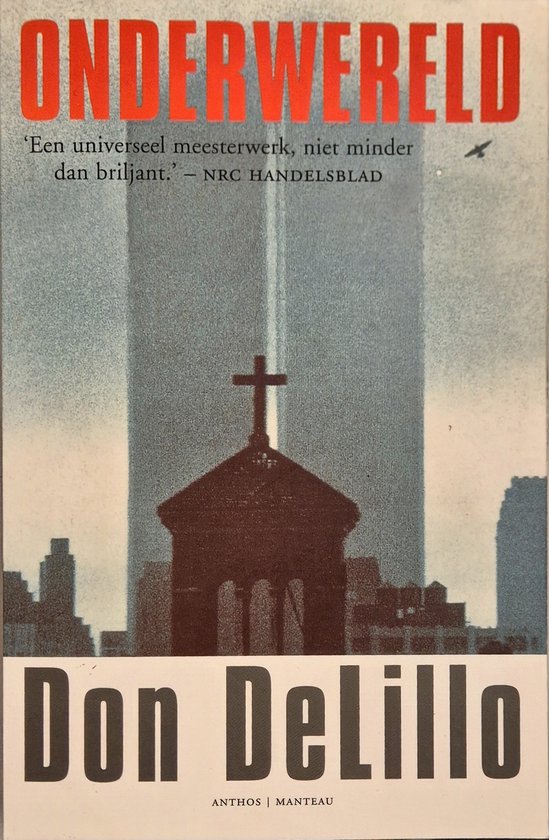 Boek met de titel 'ONDERWERELD' en de naam Don DeLillo, met een afbeelding van een kerk met een kruis erop tegen een stedelijke achtergrond met hoge gebouwen.