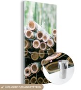 MuchoWow® Glasschilderij 80x160 cm - Schilderij acrylglas - Stapel gesneden bamboe Arashiyama - Foto op glas - Schilderijen