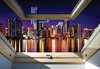Fotobehang - Vlies Behang - Uitzicht op Stad in de Nacht vanuit het Dakraam 3D - 312 x 219 cm