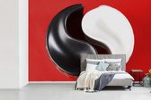 Cendrier Yin et Yang devant un fond d' fotobehang rouge