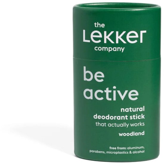 Groene deodorantstick met tekst 'be active natural deodorant stick that actually works woodland'.