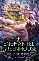 Couverture du livre 'The Enchanted Greenhouse' avec un chaton noir ailé dans la neige devant une serre hivernale enchantée.
