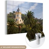 MuchoWow® Glasschilderij 90x60 cm - Schilderij acrylglas - De top van het stadhuis van Málaga Spanje - Foto op glas - Schilderijen