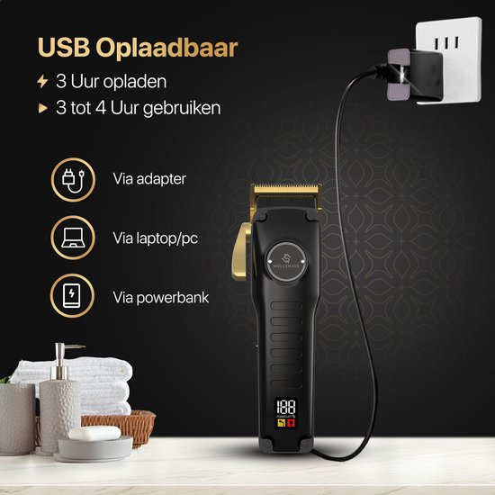 Zwarte tondeuse met gouden accenten die via USB wordt opgeladen via adapter, laptop of powerbank; 3 uur opladen, 3-4 uur gebruik.