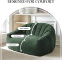 Groene zitzak met zilveren spikkels, met labels die rug-, heup- en beun ondersteuning aangeven. Ontworpen voor comfort.