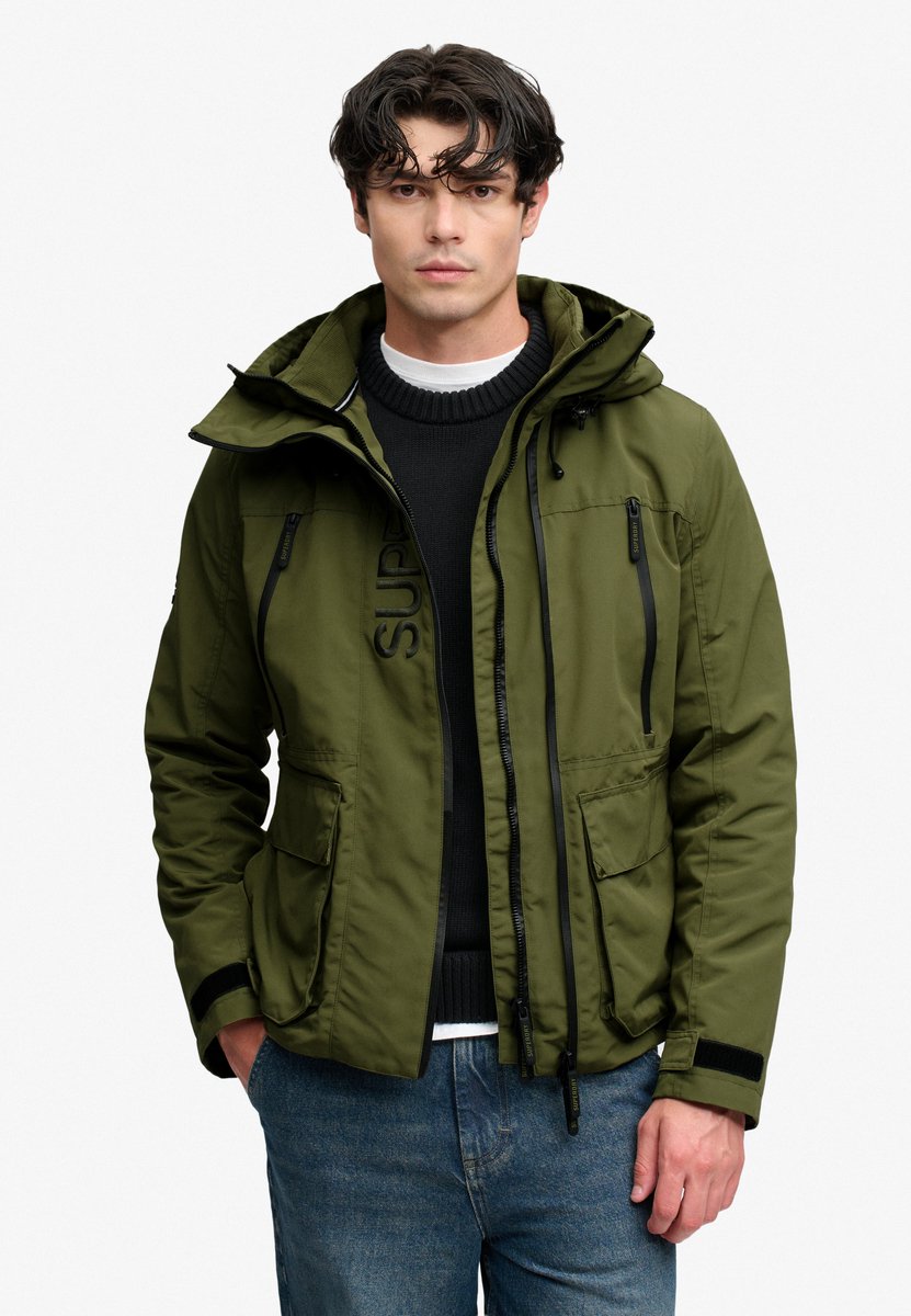 Superdry - Ultimate Geborduurd Windbreaker Jack met Capuchon - Heren