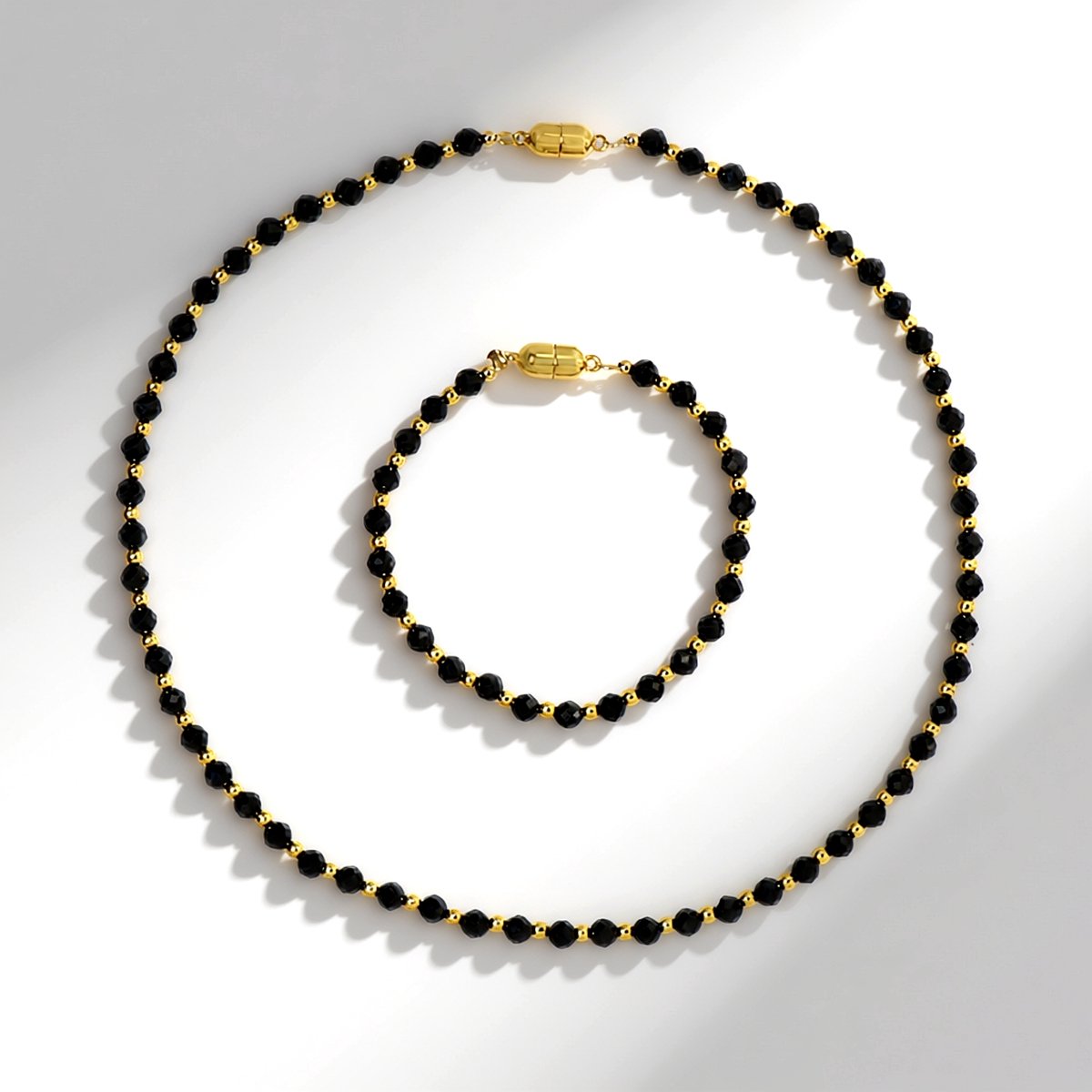 Cavill - Zilveren Sieradenset 925 Sterling Zilver - Zwarte Spinel 78,47 ct & Gouden Hematiet 23,94 ct - Magnetische Armband & Ketting - Modern Elegant