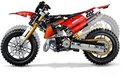 Lego Technic Ducati motorfiets, rood met zwarte en gouden details, gouden ketting en vering. Nummer 222.