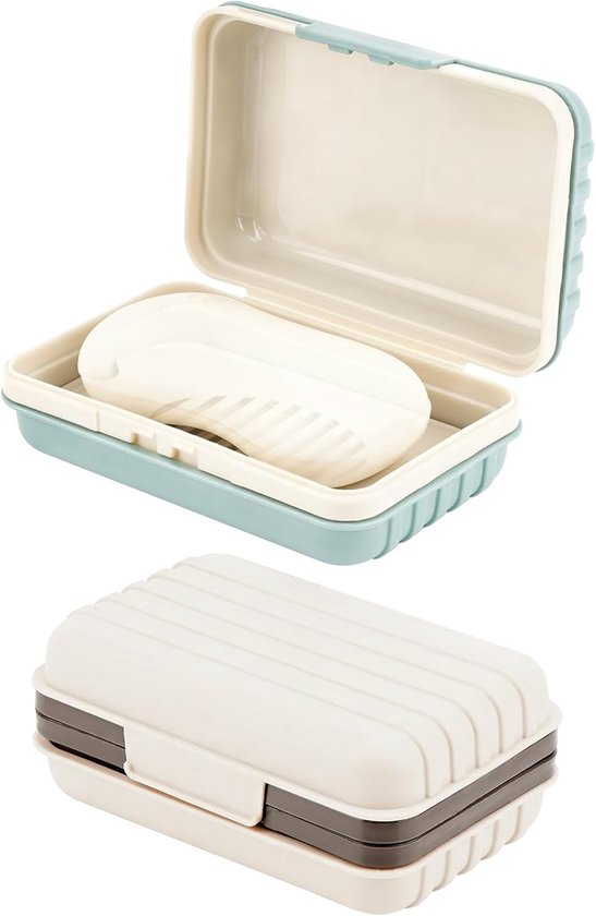 Une boîte à savon fermée gris-blanc rayée et une boîte à savon bleue ouverte avec du savon.