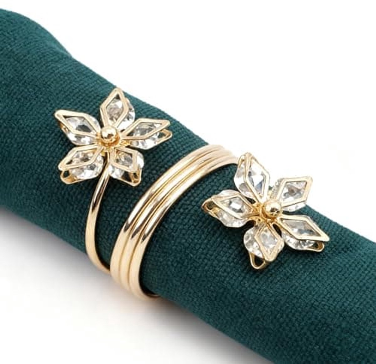Een set van 6 servetringen met opengewerkt bloemenmotief en klemmen, voor tafeldecoratie (goudkleurig).