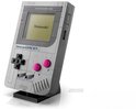Game Boy LEGO grise avec boutons roses, croix noire et logo Nintendo à l'écran. Le texte 'Nintendo GAME BOY' est visible.
