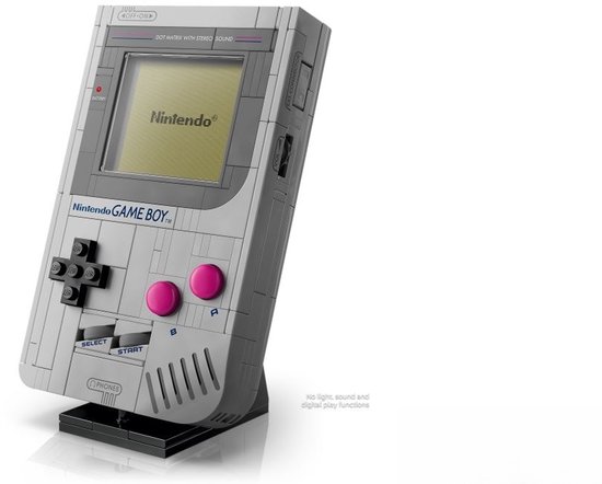 Game Boy LEGO grise avec boutons roses, croix noire et logo Nintendo à l'écran. Le texte 'Nintendo GAME BOY' est visible.