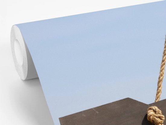 Papier peint photo vinyle - Un panneau de bienvenue est suspendu à un poteau, largeur 330 cm x hauteur 220 cm - Tirage photo sur papier peint (disponible en 7 tailles)