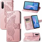 Voor Sony Xperia 10 III Vlinder Liefde Bloemen Reliëf Horizontale Flip Lederen Case met Houder & Kaartsleuven & Portemonnee & Lanyard (Rose Goud)