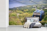 Behang - Fotobehang Een blauwe kabelbaan - Breedte 420 cm x hoogte 280 cm
