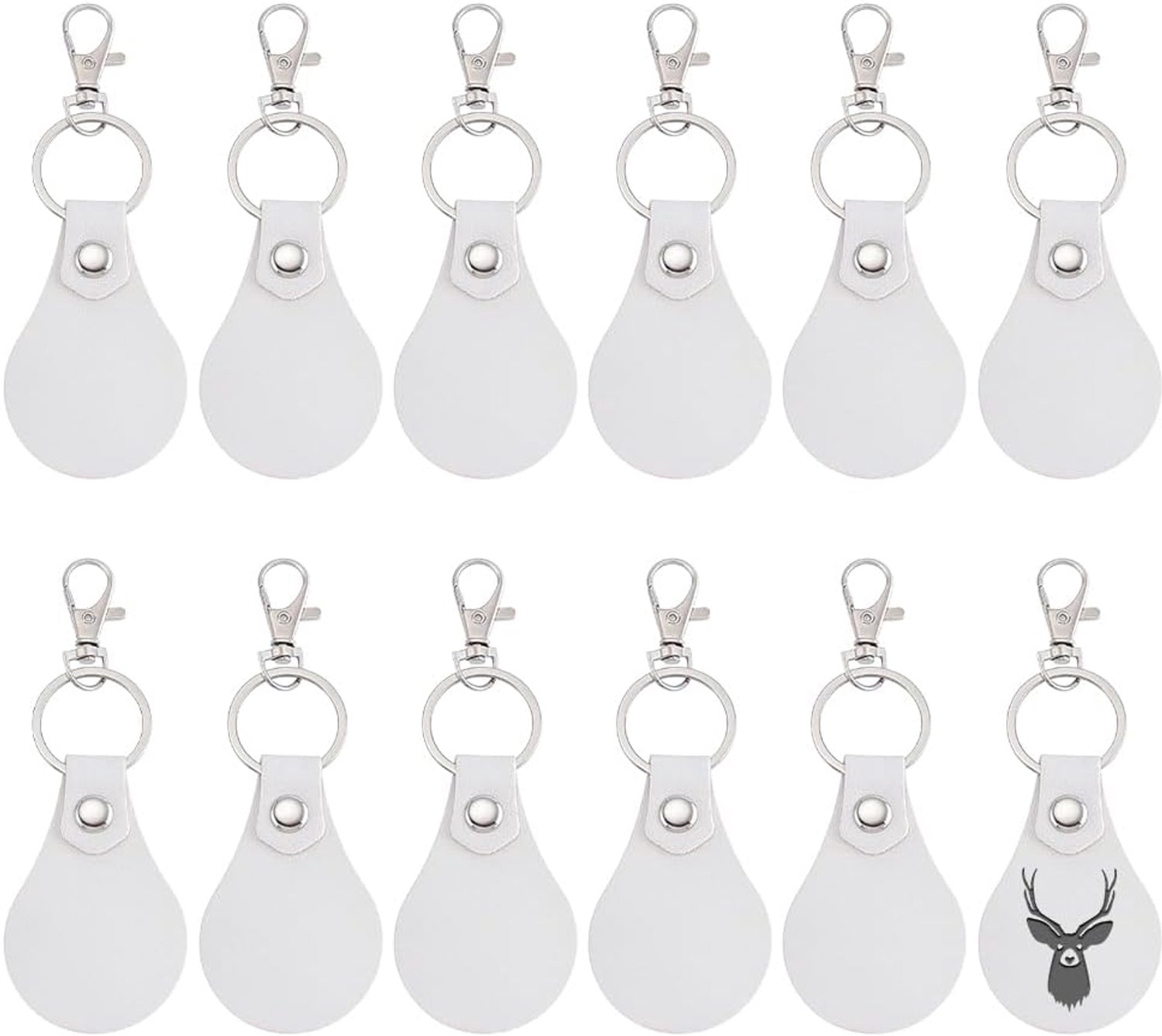 Set van 12 witte leren sleutelhangers in druppelvorm met draaibare haak en klinknagels voor graveren en stempelen