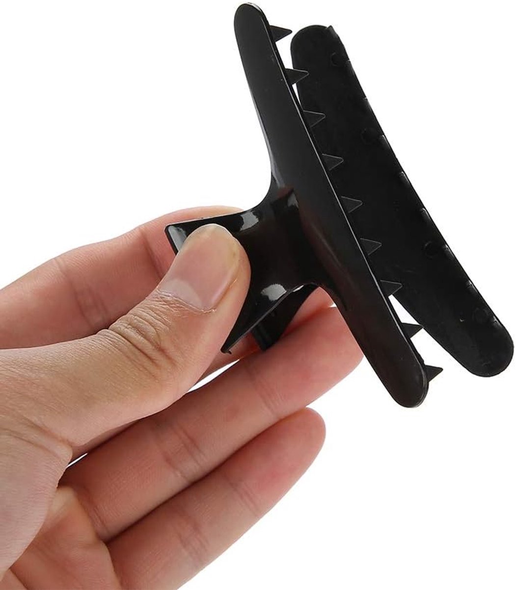 Zwarte salonclip, haarclip, voor kappersvrouwen