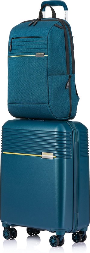 Blauwe Hedgren laptoprugzak met gele accenten, gestapeld op een blauwe koffer met gele accenten.