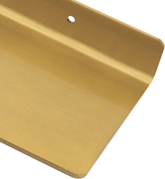 Close-up van een gouden metalen wandplank met een boorgat en gebogen rand.