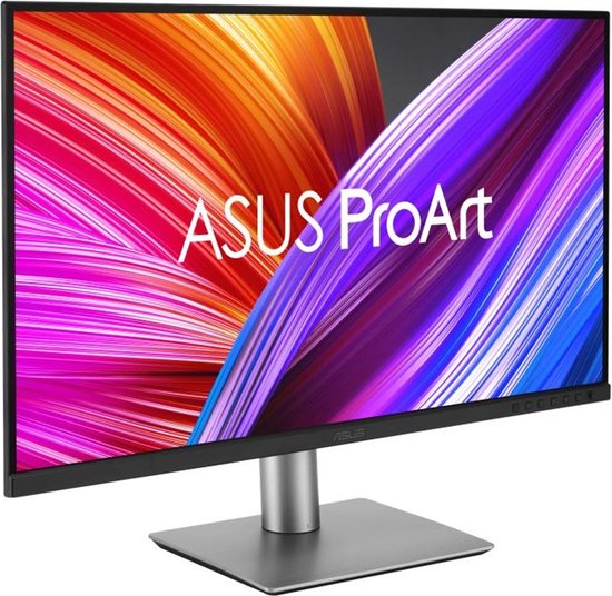 Vooraanzicht van de ASUS ProArt monitor met een levendig, golvend achtergrondpatroon en een zilveren standaard.
